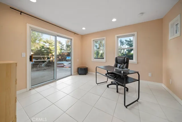 a workspace with furniture and a window