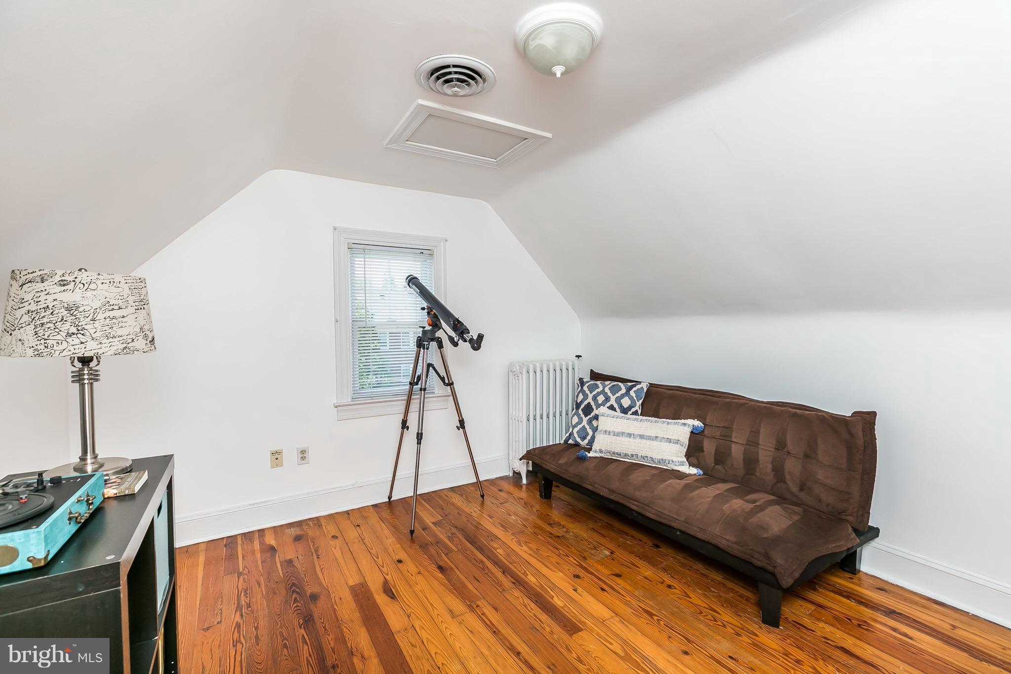 419 Hopkins Road Baltimore, MD 21212 - Photo 22 of 30 a living room with furniture and a wooden floor