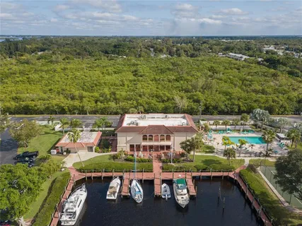 an aerial view of a house with a ocean view