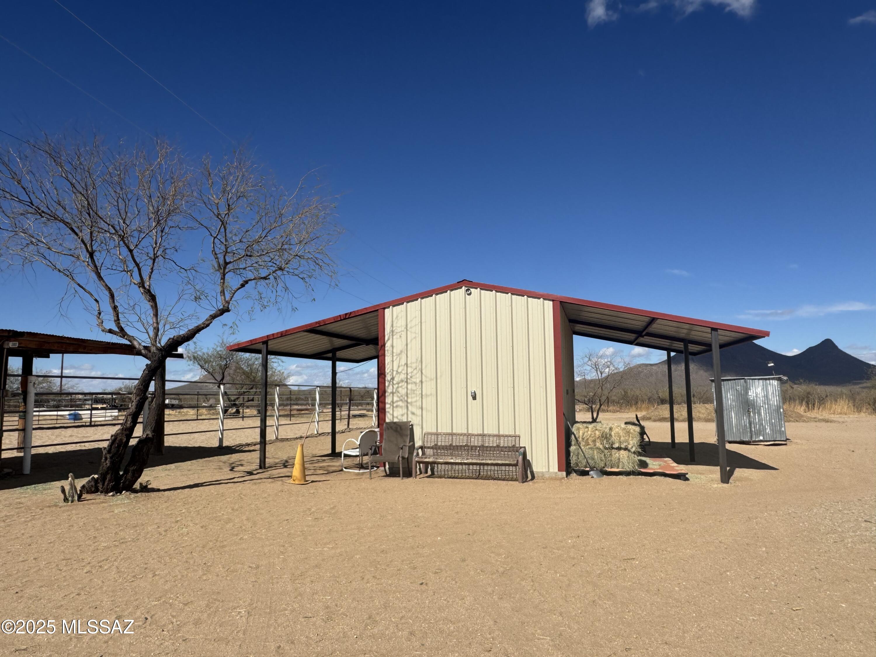 12440 South Coleman Road Tucson, AZ 85735 - Photo 11 of 45 a view of a house with a outdoor space