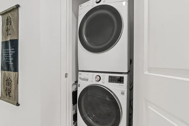 a utility room with dryer and washer