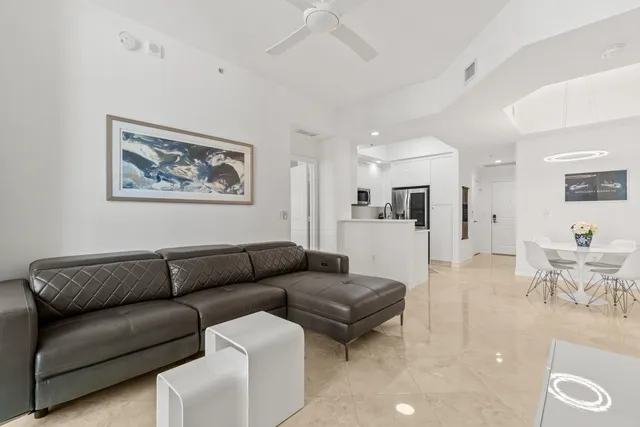 a living room with furniture and a couch