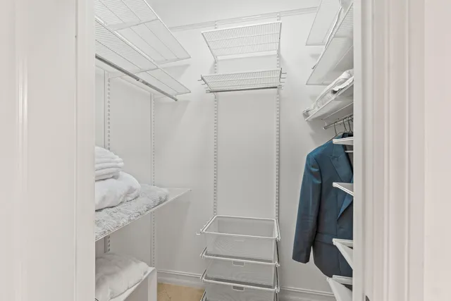 a view of staircase with white walls