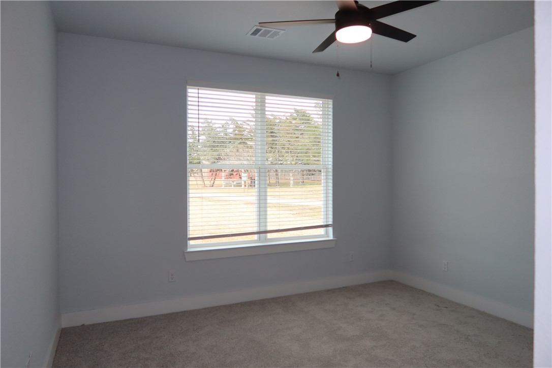2014 Reagan Court Bryan, TX 77802 - Photo 18 of 22 an empty room with a window