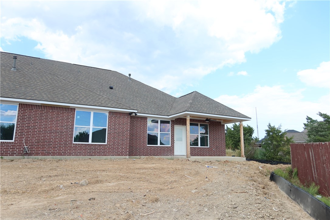 2014 Reagan Court Bryan, TX 77802 - Photo 22 of 23 a front view of a house with yard