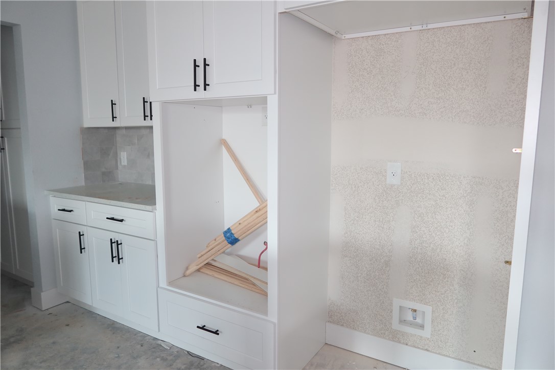 2014 Reagan Court Bryan, TX 77802 - Photo 8 of 23 a bathroom with a bathtub and shower