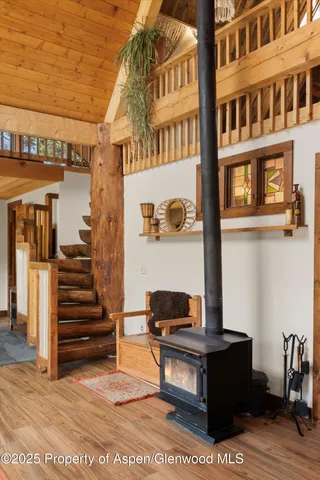 a view of a room that has a large window