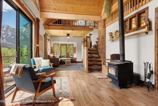a kitchen with appliances a sink and cabinets