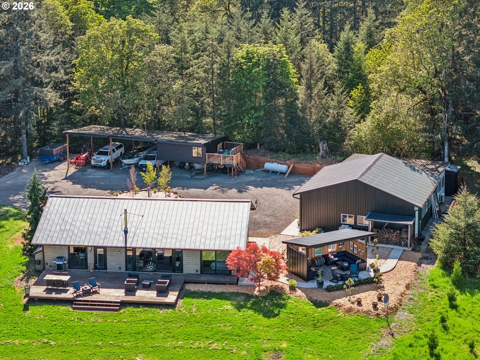 18600 Northwest Meadowlake Road Yamhill, OR 97148 - Photo 40 of 47 a view of backyard with swimming pool and outdoor seating