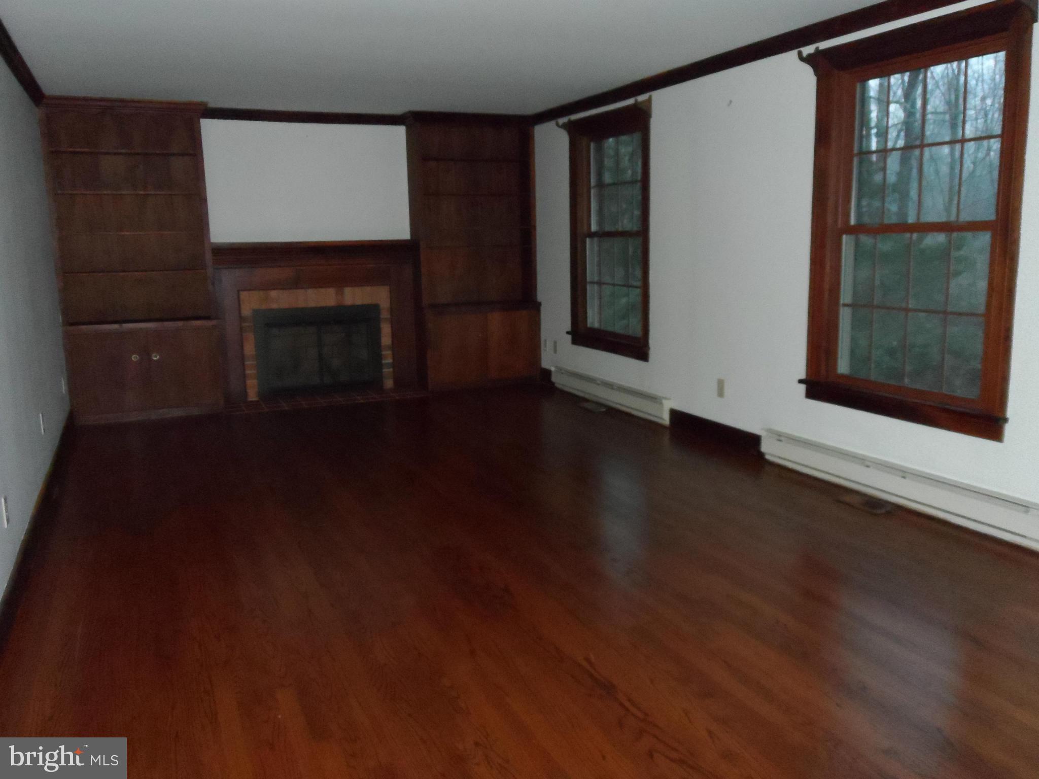 11291 Dahlgren Road King George, VA 22485 - Photo 11 of 23 Living Room with Handsome Fireplace