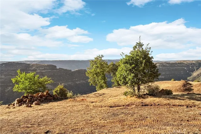 a view of a road with an ocean view