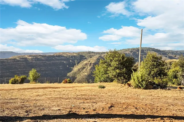 an aerial view of residential building and parking space