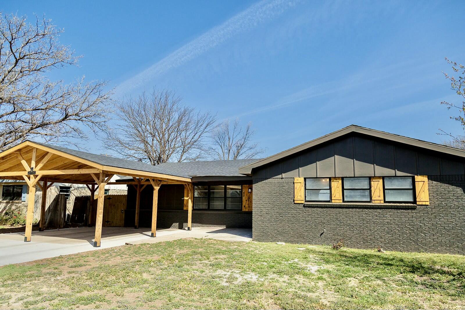 2802 West 20th Plainview, TX 79072 - Photo 2 of 50 a front view of a house with a yard