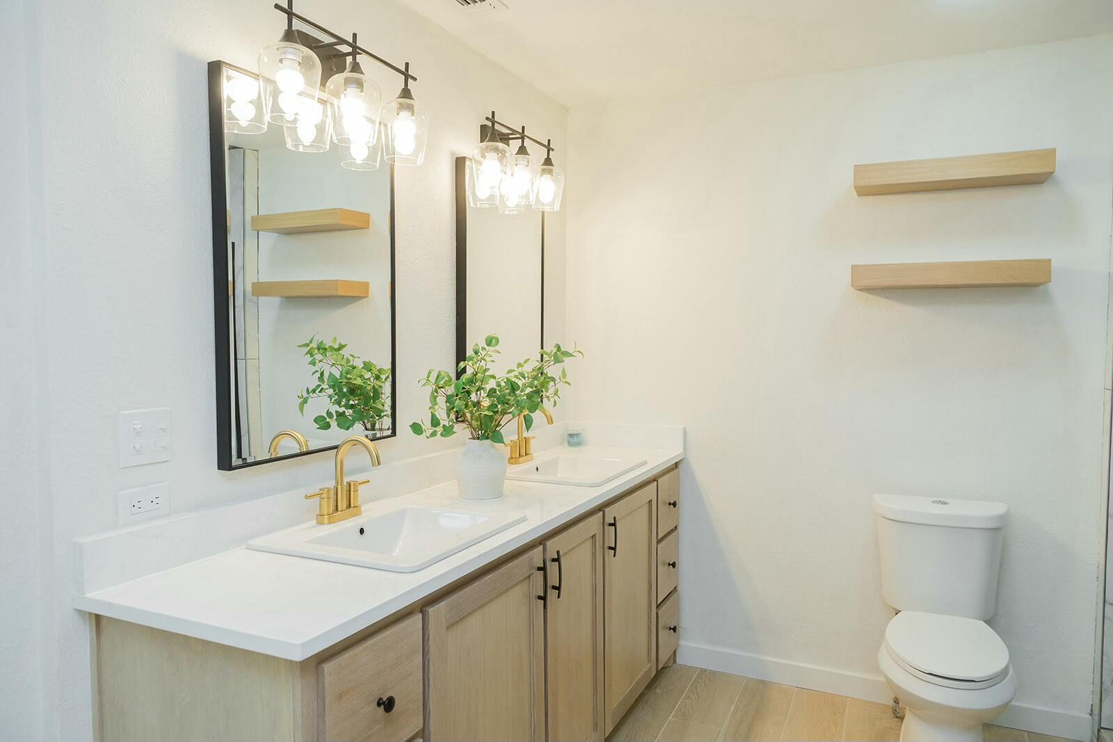 2802 West 20th Plainview, TX 79072 - Photo 29 of 50 a bathroom with a sink and a toilet
