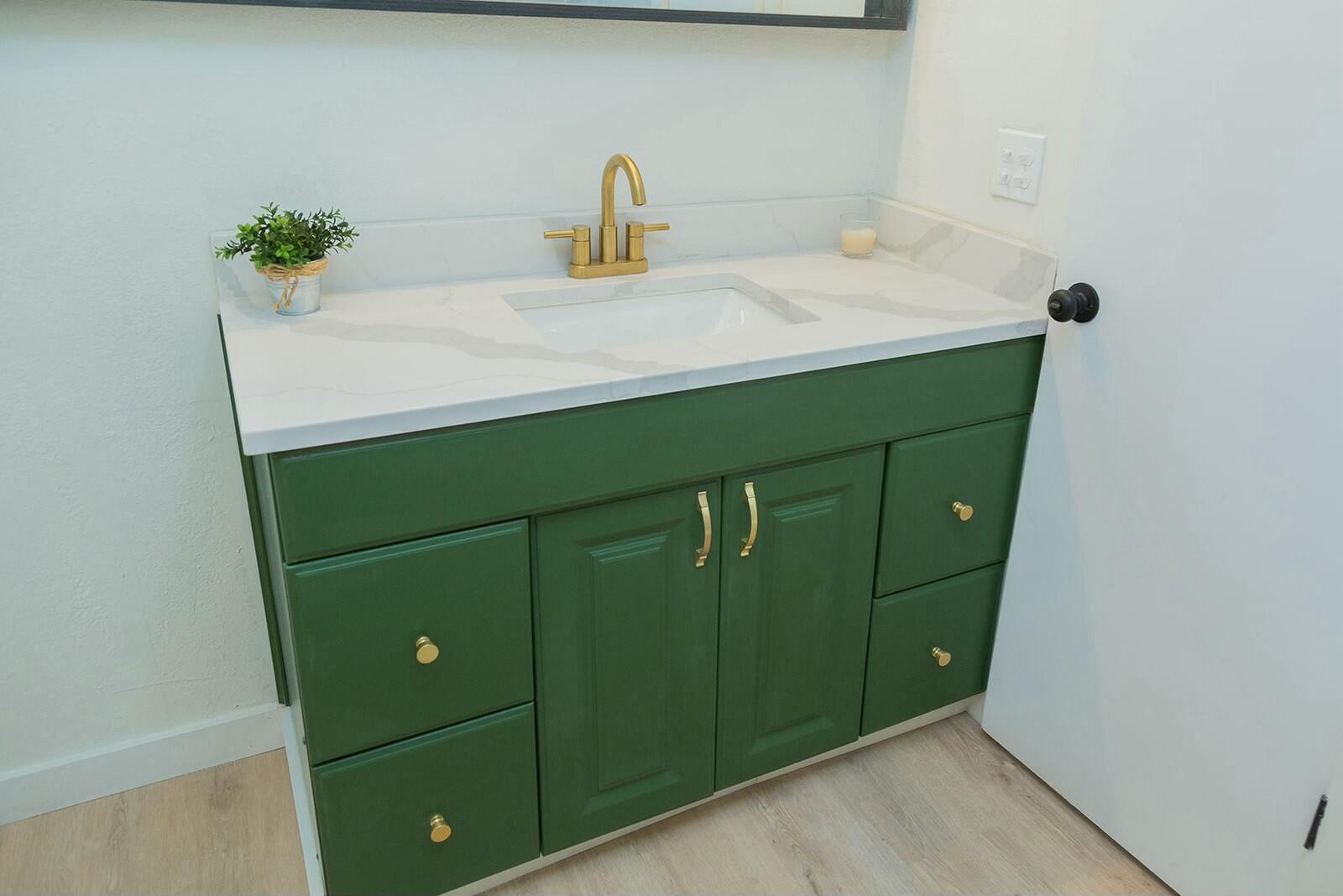 2802 West 20th Plainview, TX 79072 - Photo 37 of 50 a bathroom with a sink and a mirror
