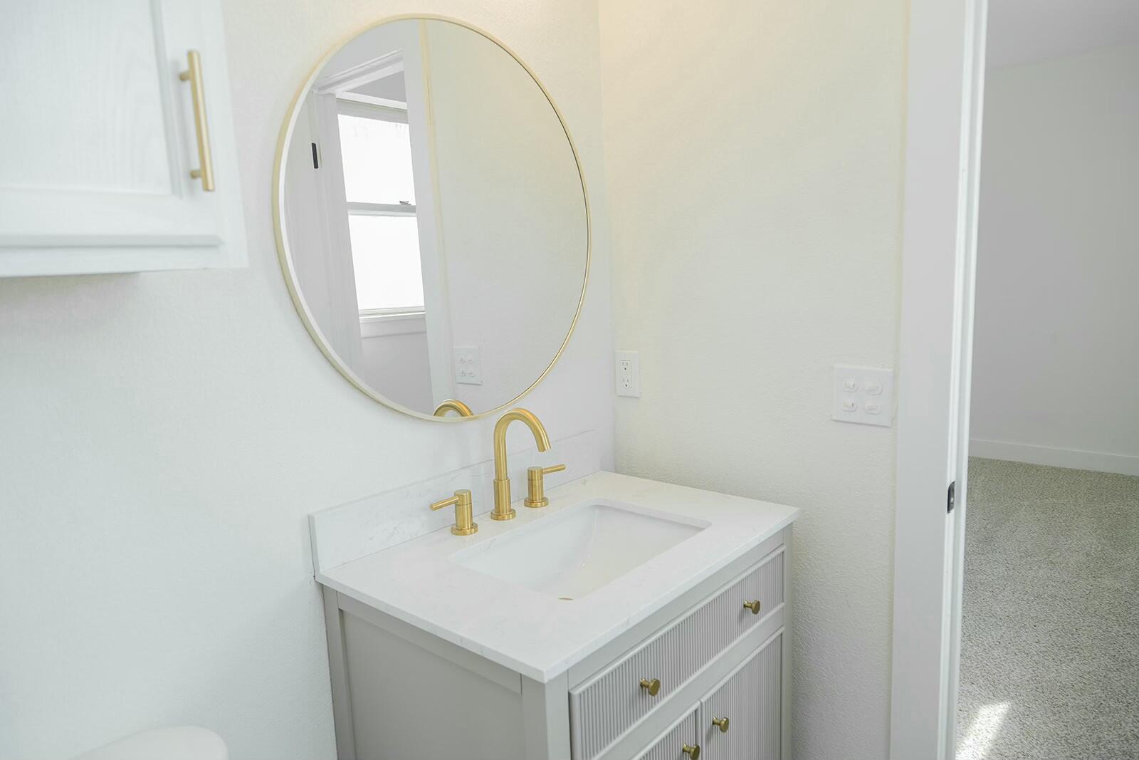 2802 West 20th Plainview, TX 79072 - Photo 41 of 50 a room with a sink and a mirror