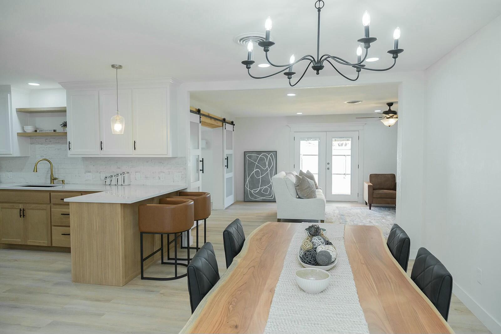 2802 West 20th Plainview, TX 79072 - Photo 6 of 50 a view of a dining room with furniture and wooden floor