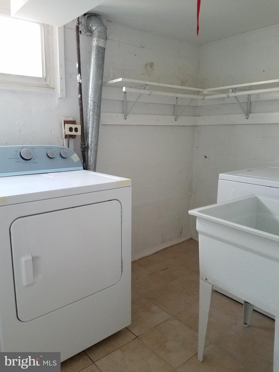 3208 Medway Street Silver Spring, MD 20902 - Photo 19 of 19 Laundry room with ful size washer/dryer