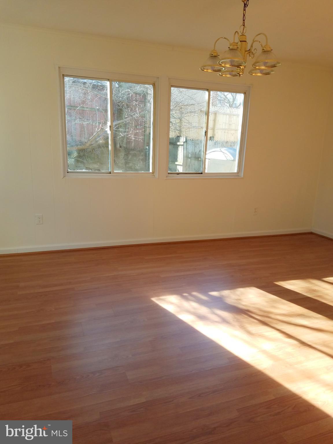 3208 Medway Street Silver Spring, MD 20902 - Photo 10 of 19 Sun filled Family Room w/exit to side yard