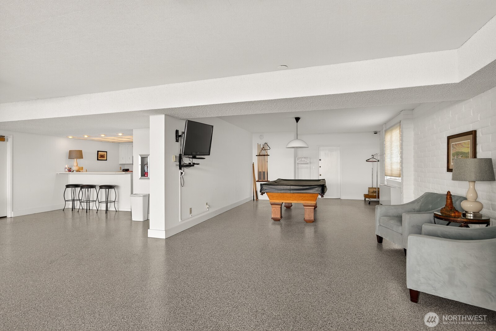 610 Front Street, Unit 302 Mukilteo, WA 98275 - Photo 30 of 40 a room with furniture and wooden floor
