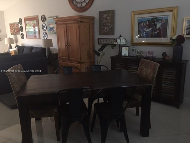 6783 Bridlewood Court, Unit 6783 Boca Raton, FL 33433 - Photo 16 of 56 a view of a dining room with furniture