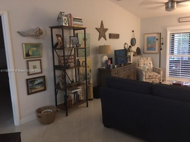 6783 Bridlewood Court, Unit 6783 Boca Raton, FL 33433 - Photo 21 of 56 a living room with furniture and a window