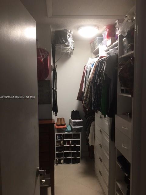 6783 Bridlewood Court, Unit 6783 Boca Raton, FL 33433 - Photo 37 of 56 a view of walk in closet