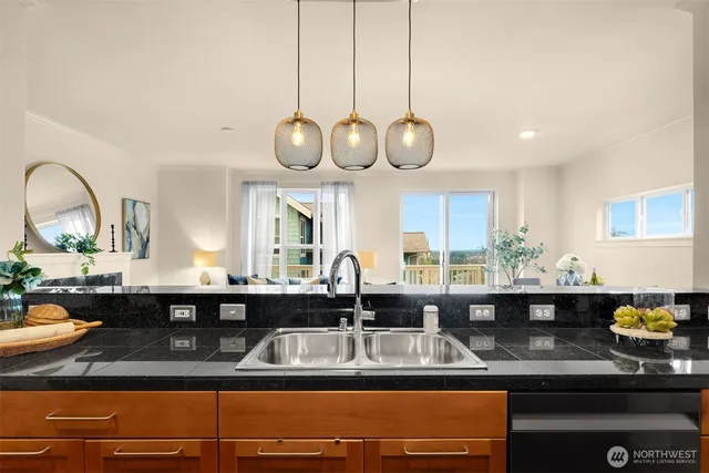 a kitchen with a counter space cabinets and appliances