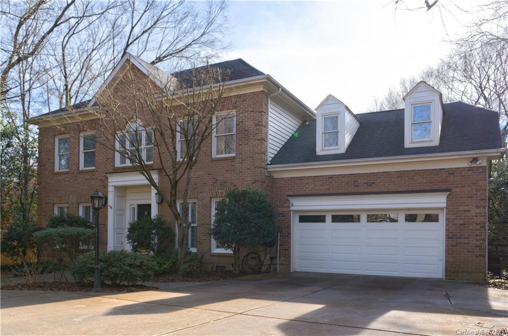 6724 Alexander Road Charlotte, NC 28270 - Photo 3 of 28 a front view of a house with a yard