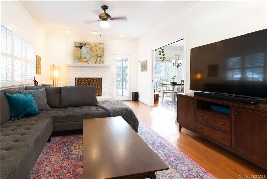 6724 Alexander Road Charlotte, NC 28270 - Photo 7 of 28 a living room with furniture and a flat screen tv