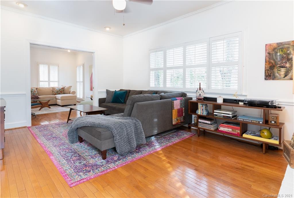 6724 Alexander Road Charlotte, NC 28270 - Photo 8 of 28 a living room with furniture and a wooden floor