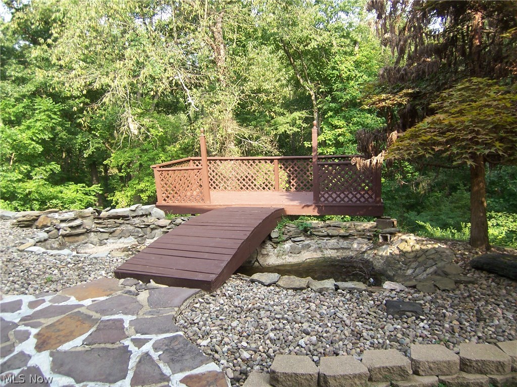 122 Rector Road Parkersburg, WV 26104 - Photo 29 of 35 Walk out side to the private deck area and ponds. Very private setting.