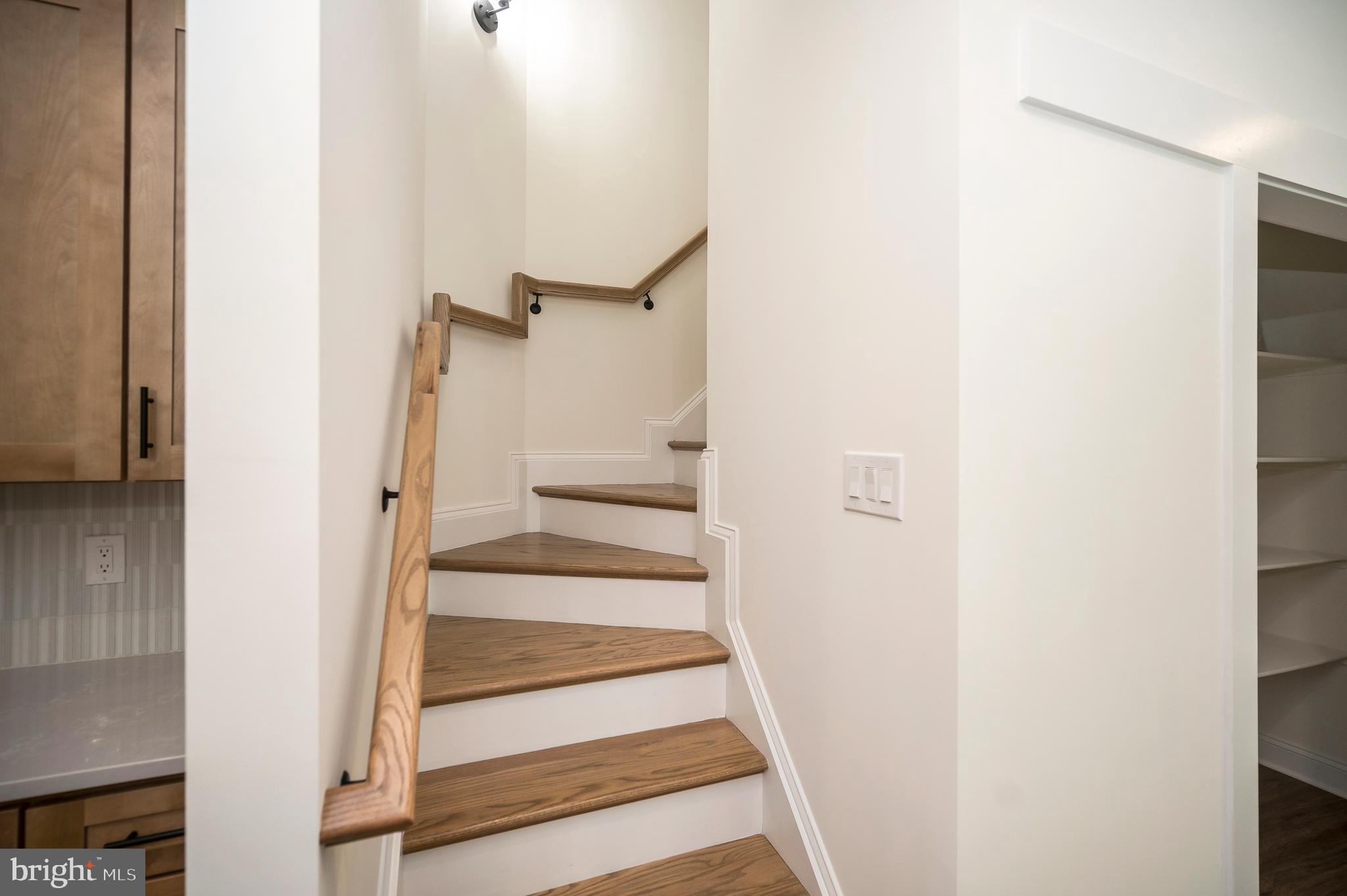 13208 Bristow Road Nokesville, VA 20181 - Photo 21 of 58 Oak rear staricase from Kirchen to upper level