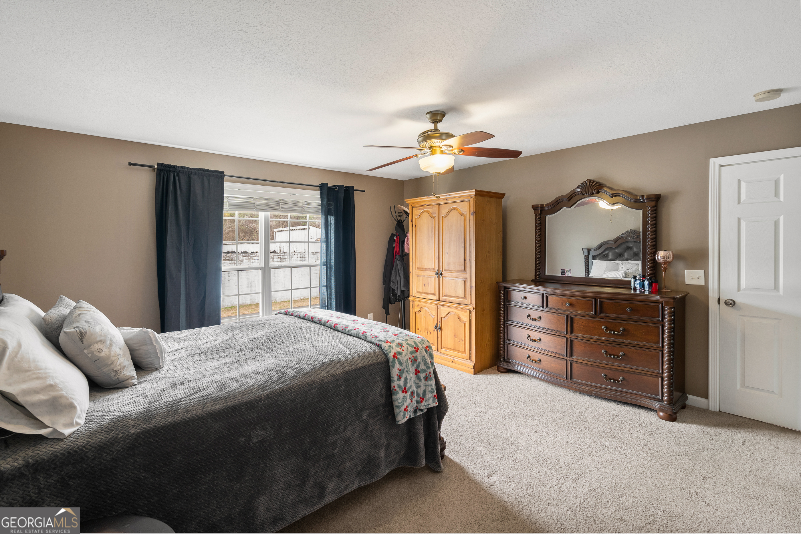80 Columbus Street Chatsworth, GA 30705 - Photo 21 of 40 a bedroom with a bed and a dresser