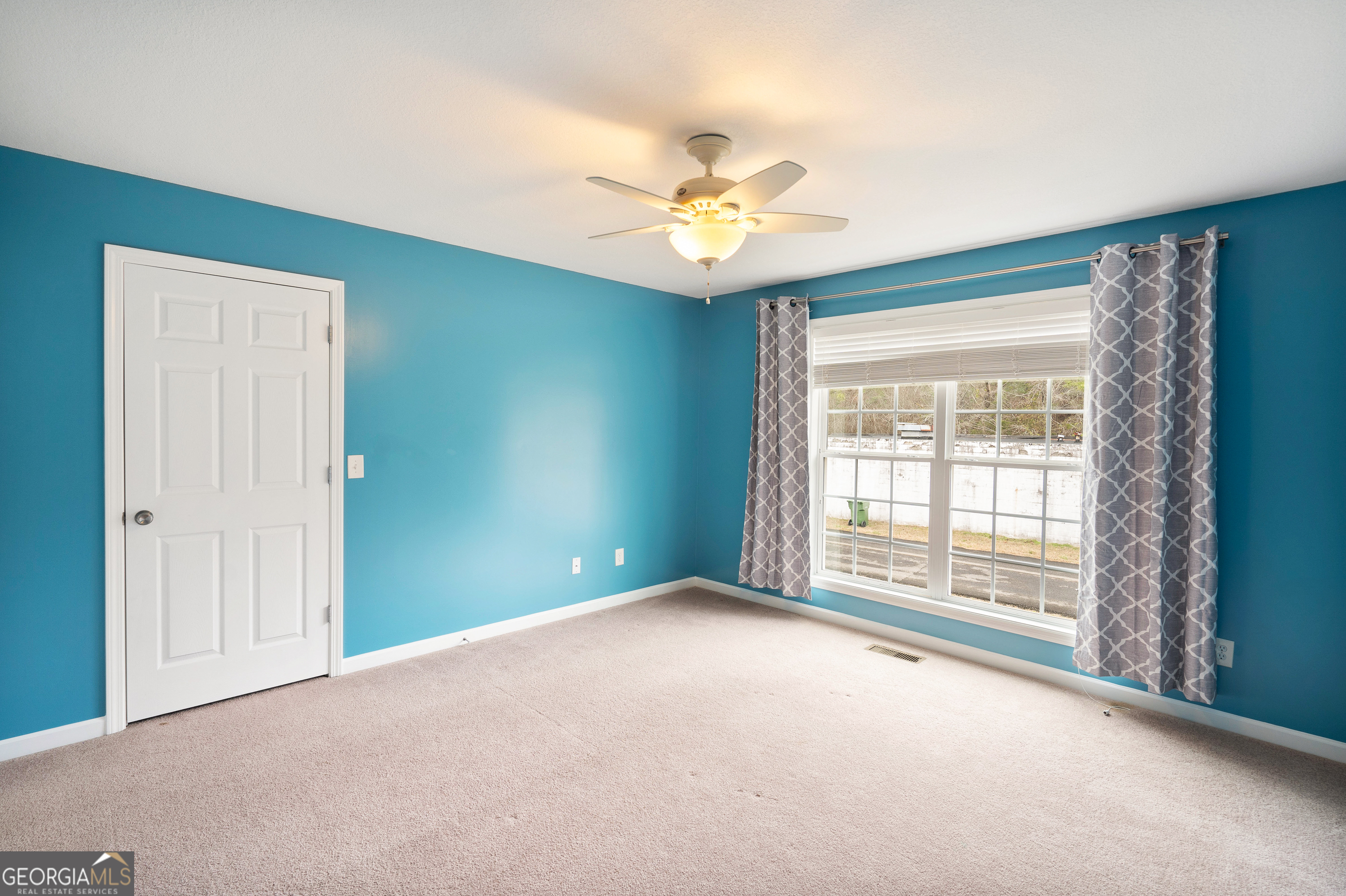 80 Columbus Street Chatsworth, GA 30705 - Photo 27 of 40 a view of an empty room with a window