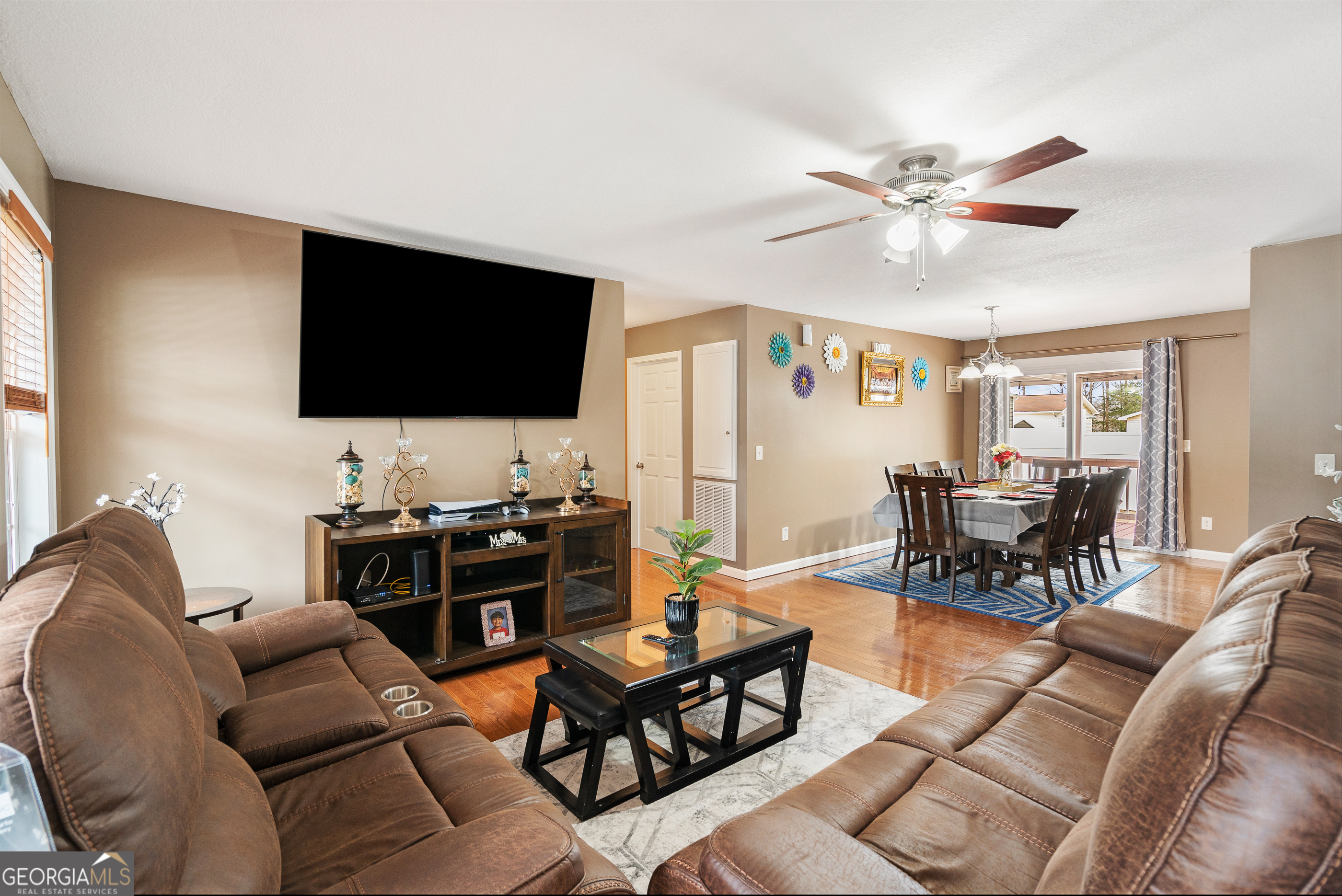 80 Columbus Street Chatsworth, GA 30705 - Photo 7 of 40 a living room with furniture and a flat screen tv