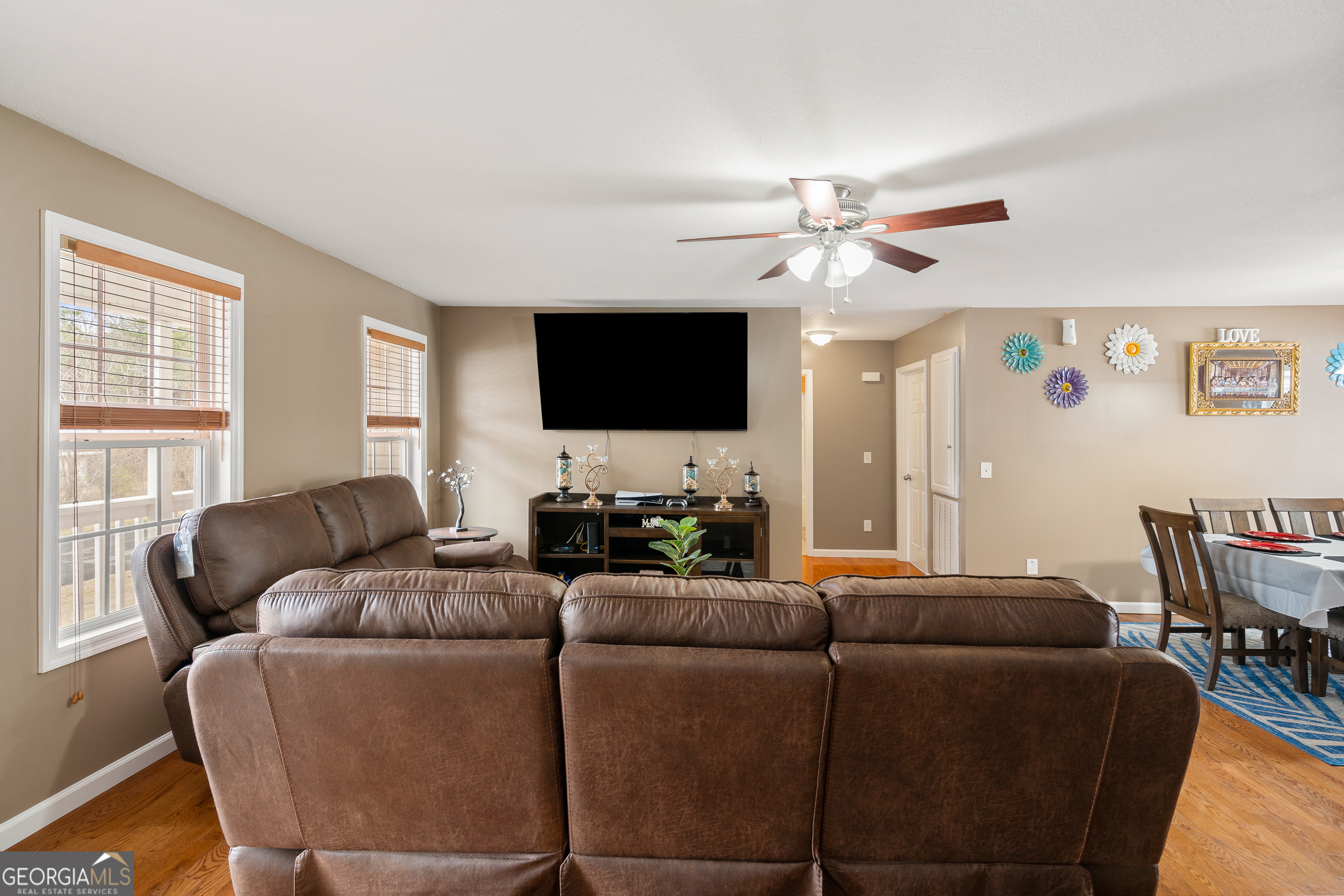 80 Columbus Street Chatsworth, GA 30705 - Photo 9 of 40 a living room with furniture and a flat screen tv