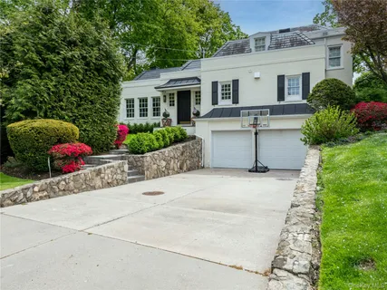 a house view with a garden space
