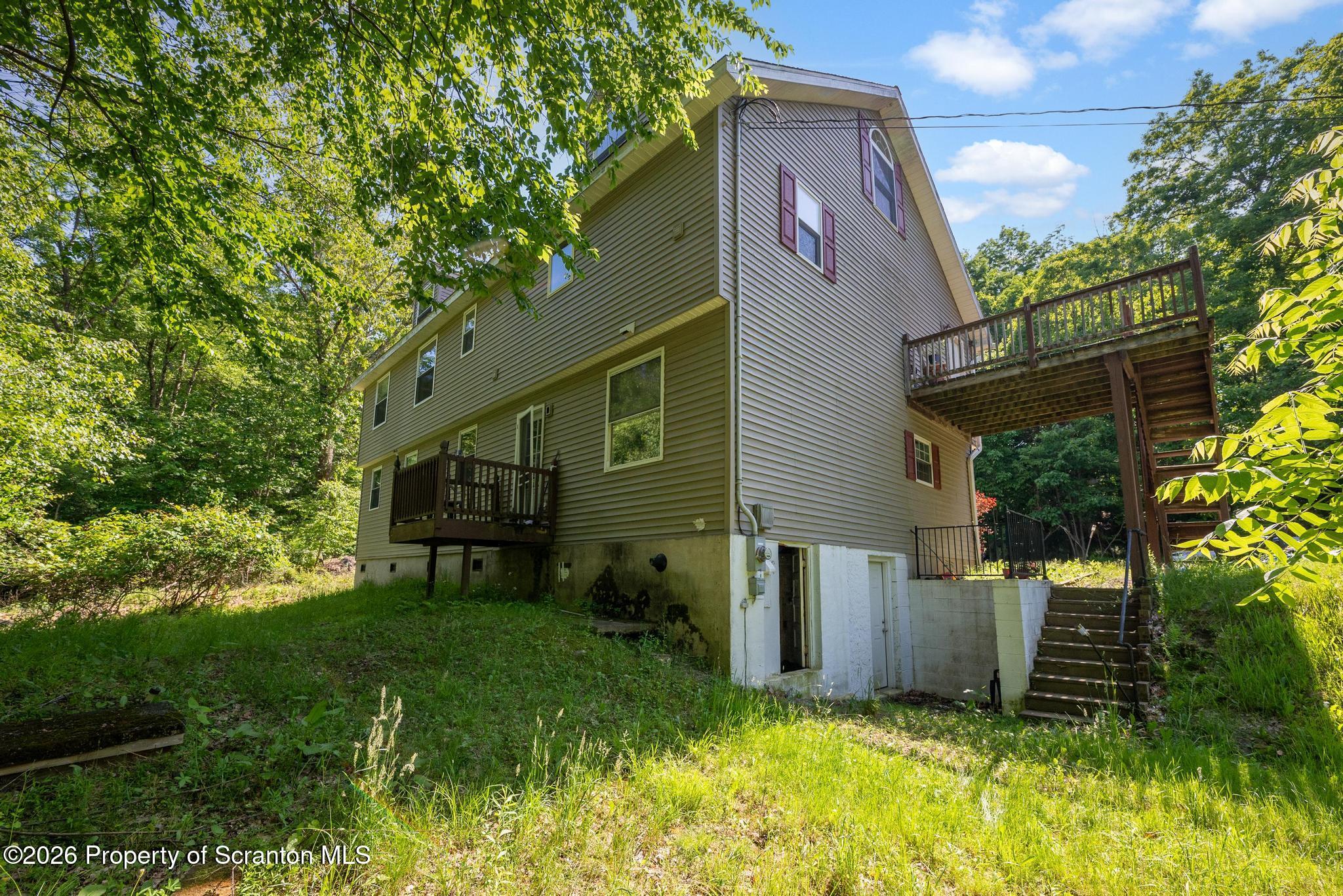 112 Spring Hill Drive Hunlock Creek, PA 18621 - Photo 4 of 54 Rear view of home