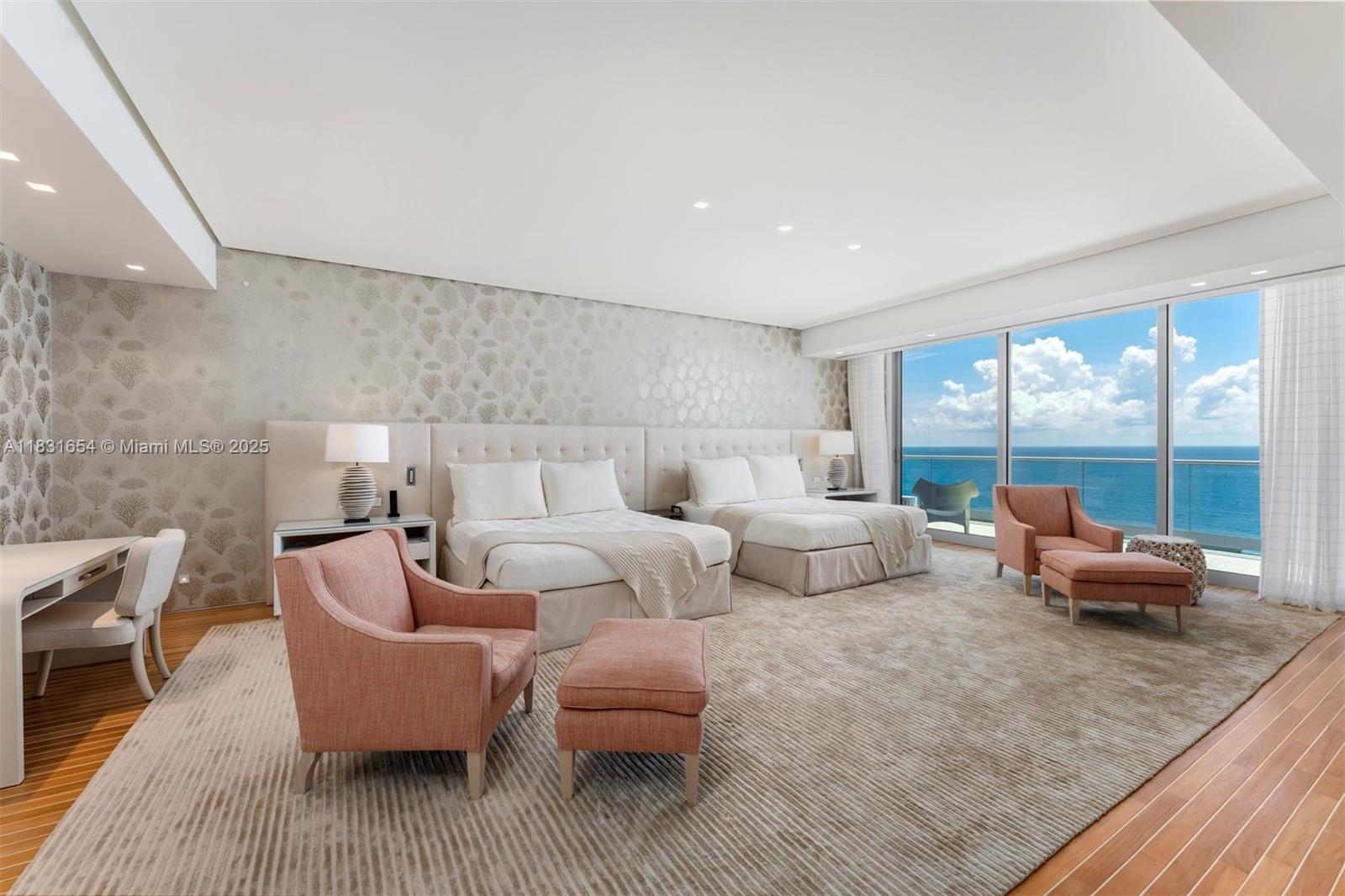 9349 Collins Avenue, Unit 1101 Surfside, FL 33154 - Photo 17 of 37 a living room with furniture and a large window