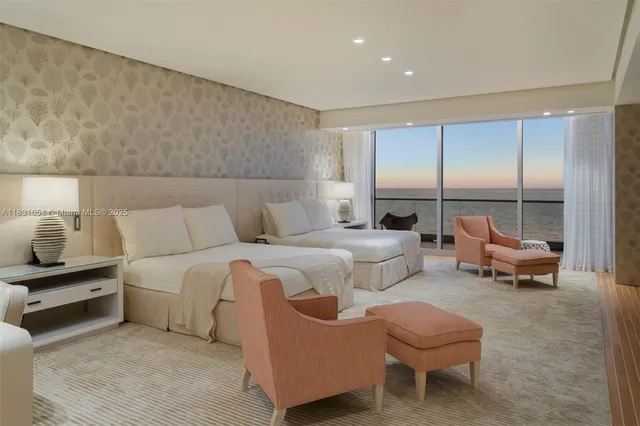 a living room with furniture and a lamp