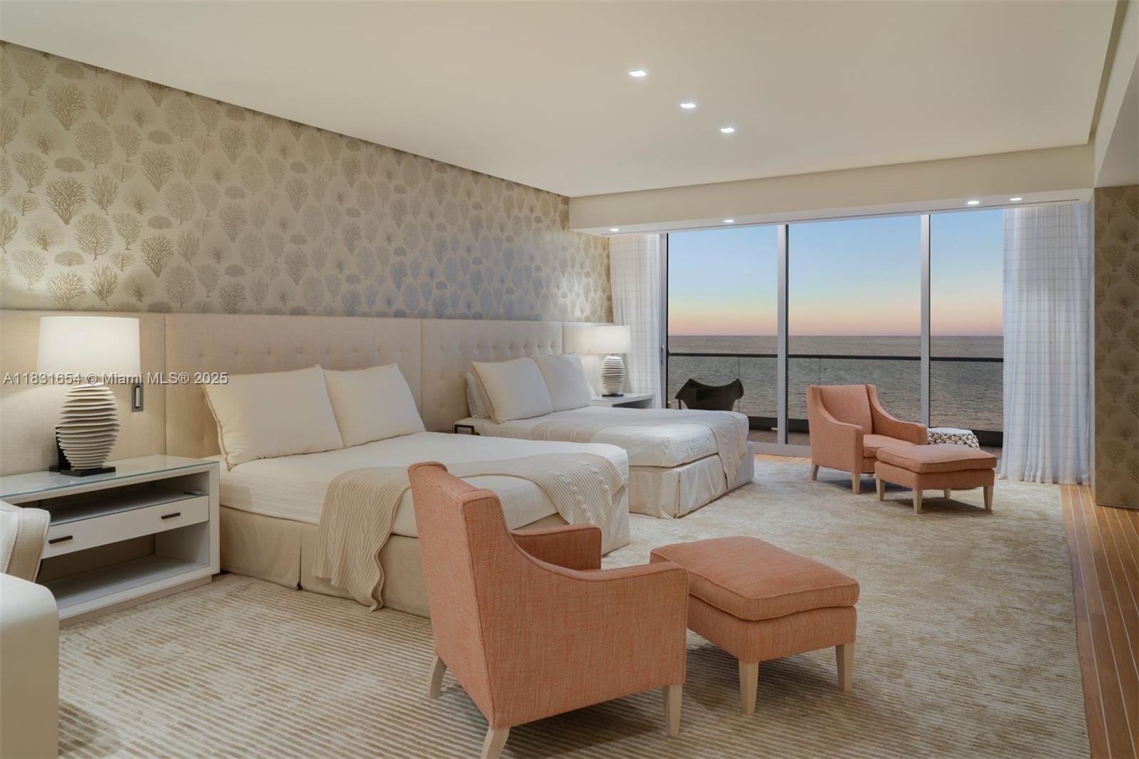 9349 Collins Avenue, Unit 1101 Surfside, FL 33154 - Photo 24 of 37 a living room with furniture and a lamp