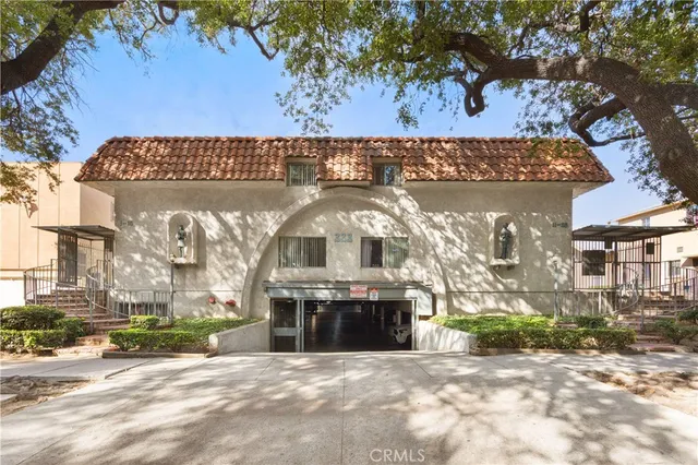 a view of a building with a sign on the wall