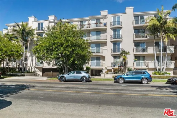 a cars parked in front of a building