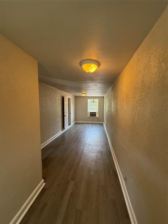 4812 Barbara Road River Oaks, TX 76114 - Photo 20 of 20 wooden floor in an empty room with a window