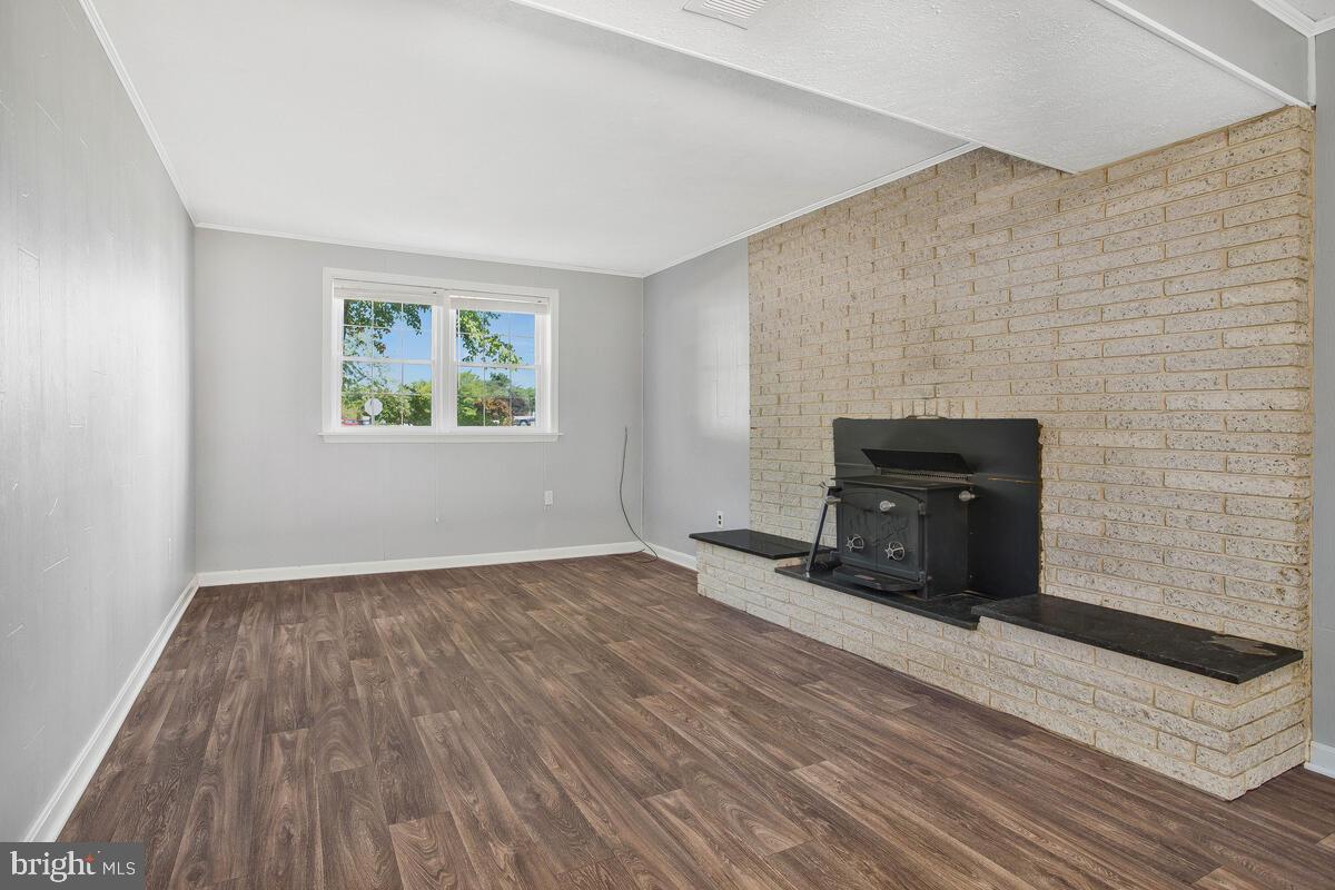 1234 Prince Street Dunkirk, MD 20754 - Photo 18 of 37 lower level rec room with fireplace