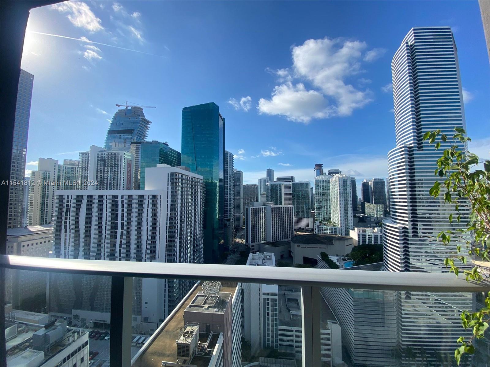 a view of a city from a balcony