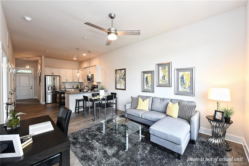935 McAlway Road, Unit 201 Charlotte, NC 28211 - Photo 12 of 21 a living room with furniture kitchen view and a window