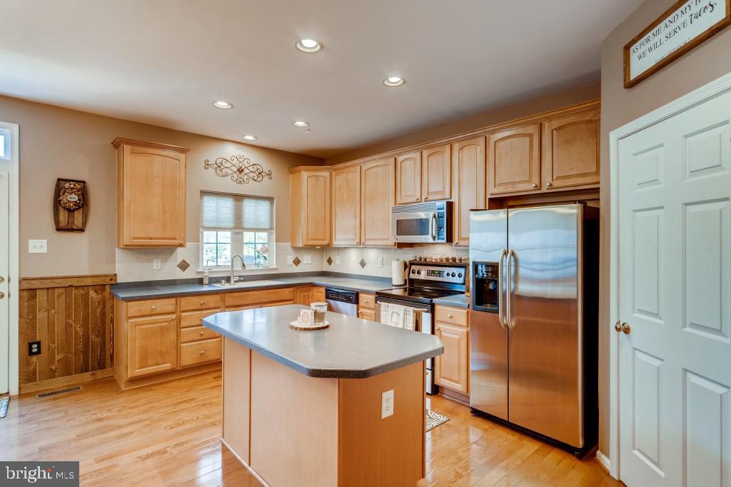 5130 Key View Way Perry Hall, MD 21128 - Photo 11 of 38 Kitchen w/SS Appliances & Solid Surface Counters