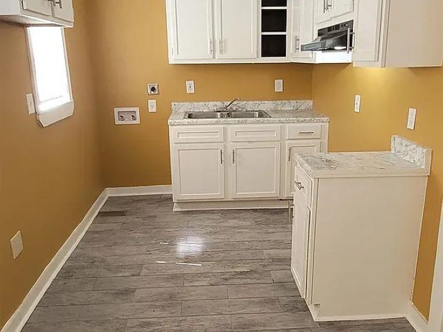 2344 Warren Street Memphis, TN 38106 - Photo 4 of 9 a view of a storage & utility room with washer and dryer